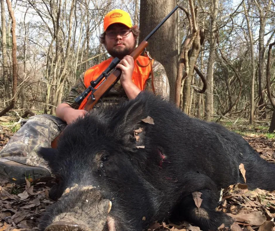 Gray Holbrook with a successful wild hog hunt